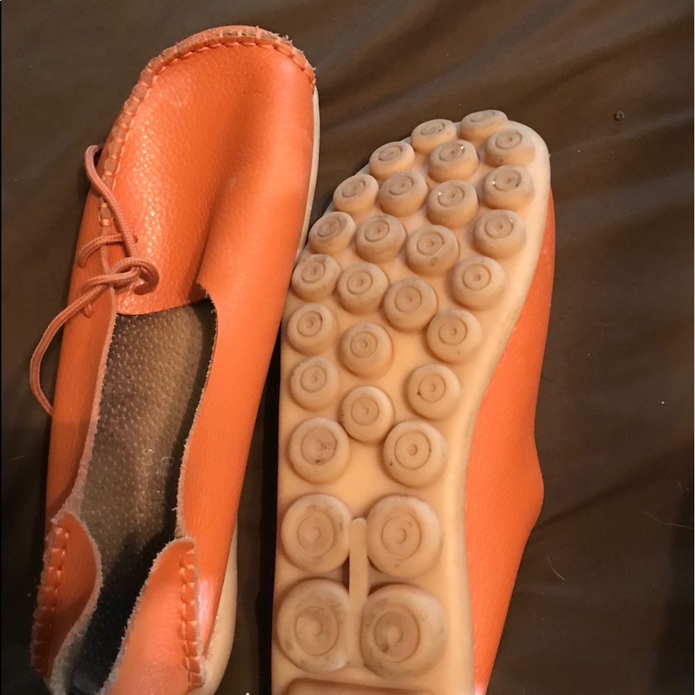 Orange flat slip ons